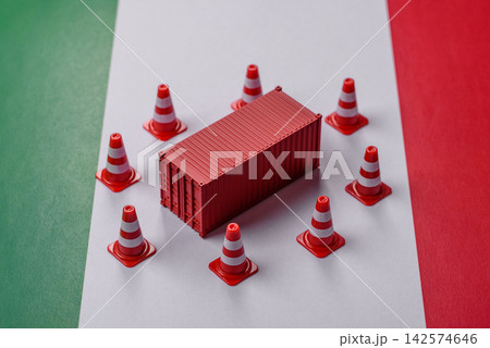 The cargo container ban on the Italian flag as a conceptual backdrop. Cargo container embargo The cargo container ban on the Italian flag as a conceptual backdrop. Cargo container embargo 142574646