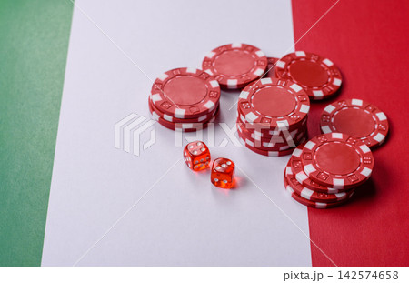 Playing cards, dice and chips on a table, a gambling game of blackjack. Cards, dice and chips 142574658