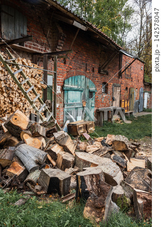 Old red brick outbuilding in a Russian village Old red brick outbuilding in a Russian village 142578047