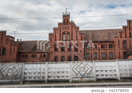 Red brick ensemble of the Tapiau Castle in Gvardeysk. Russia Red brick ensemble of the Tapiau Castle in Gvardeysk. Russia 142578050