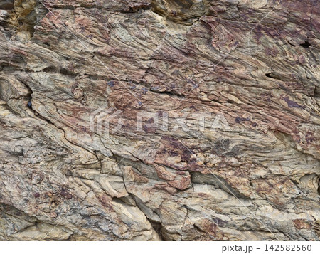serene rock formation in natural outdoor environment with wide-angle perspective and brown and gray igneous rock material, geological studies and educational resources. serene rock formation in natural outdoor environment with wide-angle perspective and brown and gray igneous rock material, geological studies and educational resources. 142582560