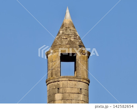 serene conical tower stationary against clear sky with window and stone and metal materials top down view in historical sites setting blue and gray tones natural light clean background copy serene conical tower stationary against clear sky with window and stone and metal materials top down view in historical sites setting blue and gray tones natural light clean background copy 142582654