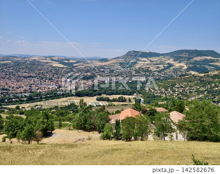 Village landscape panoramic view, in rural countryside with hills and mountains in the, with houses, fields, trees, river, from a high vantage point overlooking the village perspective. Village landscape panoramic view, in rural countryside with hills and mountains in the, with houses, fields, trees, river, from a high vantage point overlooking the village perspective. 142582676
