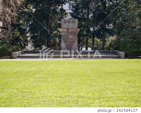 Serene memorial setting. Calm and beautiful park designed for solemn ceremonies and quiet thoughts Serene memorial setting. Calm and beautiful park designed for solemn ceremonies and quiet thoughts 142584137