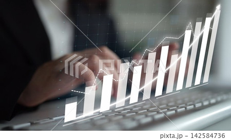 Business professional analyzing data trends and financial growth using modern technology and statistics on a computer keyboard in a corporate environment Copula Business professional analyzing data trends and financial growth using modern technology and statistics on a computer keyboard in a corporate environment Copula 142584736