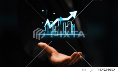 Businessman Holding Digital Growth Graph with Cityscape in Background, Symbolizing Economic Progress and Innovation for Financial Success. Entropy Businessman Holding Digital Growth Graph with Cityscape in Background, Symbolizing Economic Progress and Innovation for Financial Success. Entropy 142584932