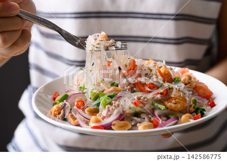 Thai spicy glass noodle salad with minced pork and shrimp (Yum Woon Sen) Thai spicy glass noodle salad with minced pork and shrimp (Yum Woon Sen) 142586775