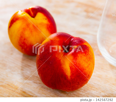 Fresh nectarine fruit served on table Fresh nectarine fruit served on table 142587292