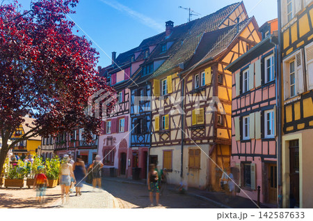 Embankment of Lauch River with historical houses in Colmar, France Embankment of Lauch River with historical houses in Colmar, France 142587633