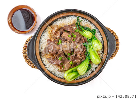 Chinese claypot rice with savory pork offal and bok choy vegetables, Cantonese baozaifan meal Chinese claypot rice with savory pork offal and bok choy vegetables, Cantonese baozaifan meal 142588371