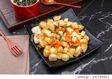 stir Fried Chinese Steamed Bread Cubes with Vegetables, Traditional Shaanxi Snack stir Fried Chinese Steamed Bread Cubes with Vegetables, Traditional Shaanxi Snack 142588821