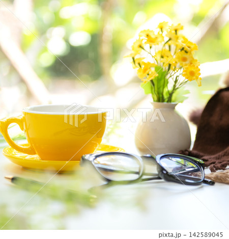 Dream plan notebook workspace inspiring personal growth and life goals with yellow cup coffee Dream plan notebook workspace inspiring personal growth and life goals with yellow cup coffee 142589045