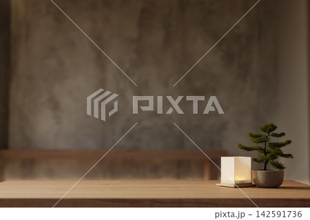 Close up of a wooden table with potted bonsai plant and decorative cube lamp in a loft wall room. 142591736