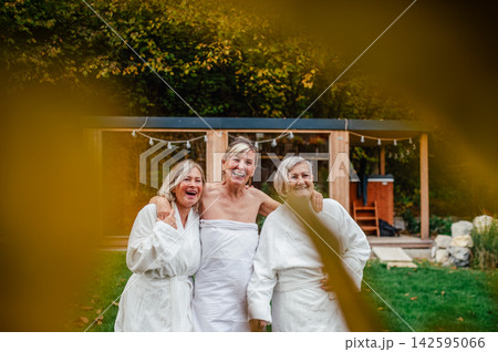 Happy senior friends during wellness retreat. 142595066