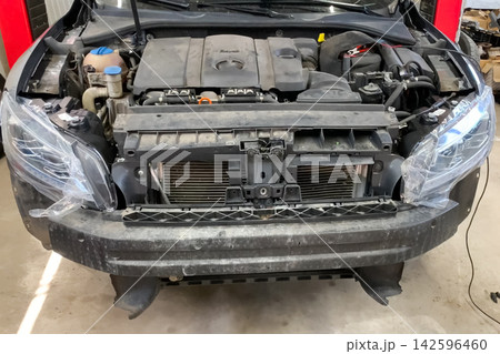 New car headlights, replacement of headlights on car. 142596460