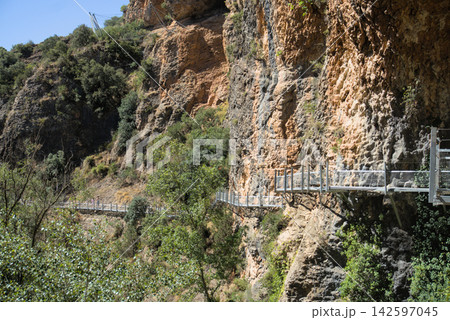 Tiered metal walkways on a cliff at the Pasarelas del Vero Alquezar Spain Tiered metal walkways on a cliff at the Pasarelas del Vero Alquezar Spain 142597045