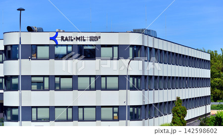 Warsaw, Poland. 15 August 2026. Urban landscape. Neon sign with the inscription: Rail Mil. Kombud Group. Warsaw, Poland. 15 August 2026. Urban landscape. Neon sign with the inscription: Rail Mil. Kombud Group. 142598602