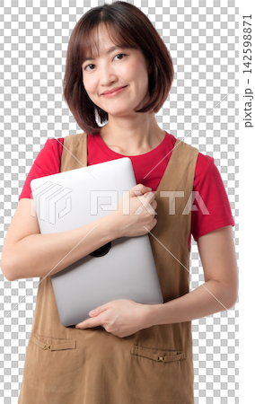 Asian woman holding laptop with warm smile in casual workwear isolated on transparent background for business and technology use 142598871