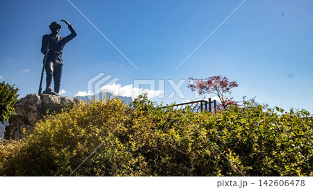 man with smartphone on top of mountain man with smartphone on top of mountain 142606478