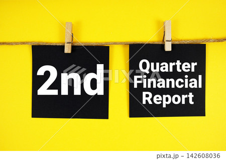 2nd Quarter Financial Report paper notes hanging on the rope with clothespins 2nd Quarter Financial Report paper notes hanging on the rope with clothespins 142608036