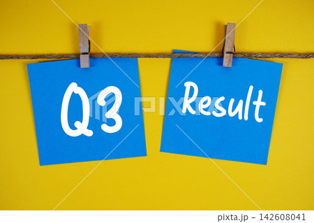 Q3 Result paper notes hanging on the rope with clothespins 142608041