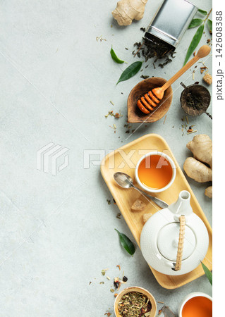 Natural Tea and Wellness Flat Lay with Herbs, Honey, and Ginger Natural Tea and Wellness Flat Lay with Herbs, Honey, and Ginger 142608388