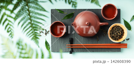 Modern Asian Tea Ceremony Banner with Red Teapot and Cups Modern Asian Tea Ceremony Banner with Red Teapot and Cups 142608390
