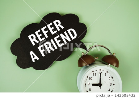 Refer A Friend text on speech bubble with alarm clock on green background Refer A Friend text on speech bubble with alarm clock on green background 142608432