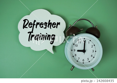 Refresher Training text on speech bubble with alarm clock on green background Refresher Training text on speech bubble with alarm clock on green background 142608435