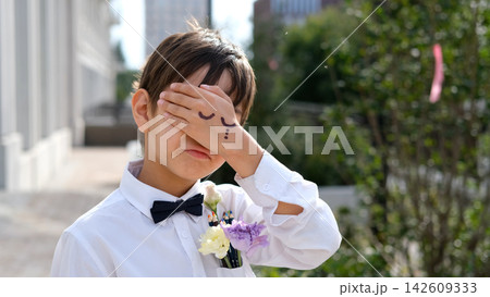 Schoolboy Covering His Face with Hand-Drawn Closed Eyes, Back to School Emotions, September 1, School Stress, Humor and Childhood Creativity 142609333