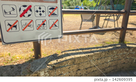 Public rules sign uses pictograms to show prohibited activities in an outdoor recreation area. Concepts: public safety, regulations, visitor guidance, responsible tourism, behavior, recreation Public rules sign uses pictograms to show prohibited activities in an outdoor recreation area. Concepts: public safety, regulations, visitor guidance, responsible tourism, behavior, recreation 142609395