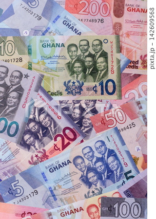 Ghana, Ghanaian paper money, cedi banknotes as currency for exchange or travel. Ghana money Ghana, Ghanaian paper money, cedi banknotes as currency for exchange or travel. Ghana money 142609568