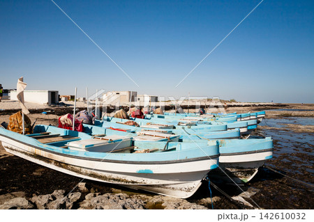 Al Bahadur beach view, Oman landmark. Boats on beach 142610032