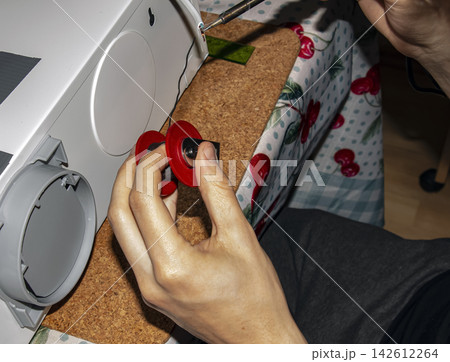Hand Soldering Wire Connection on Metal Equipment Housing Hand Soldering Wire Connection on Metal Equipment Housing 142612264