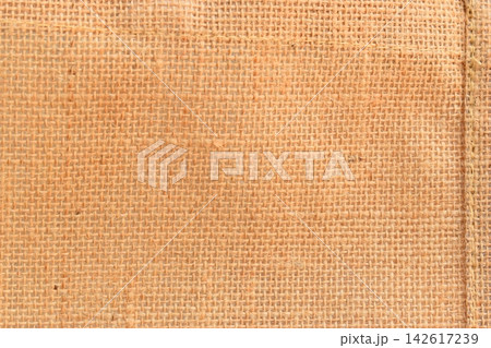 brown woven burlap texture for desing background brown woven burlap texture for desing background 142617239