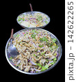 Spicy Pork Skin and Glass Noodle Salad in Stainless Steel Tray, focus selective 142622265