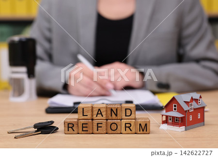 Land reform initiative focusing on housing and property rights at a legal office Land reform initiative focusing on housing and property rights at a legal office 142622727