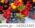 Market in Prague shows display of fresh fruits during morning hours 142623365