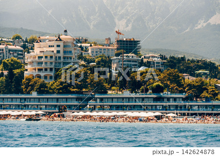 Yalta, Crimea, View cityscape panorama of city from Black Sea Yalta, Crimea, View cityscape panorama of city from Black Sea 142624878