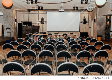 Interior of large classroom, student class at institute, conference hall lecture Interior of large classroom, student class at institute, conference hall lecture 142625251
