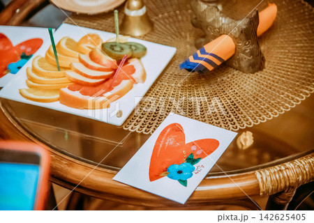 Festive decor for Valentine Day in interior romantic design with hearts card Festive decor for Valentine Day in interior romantic design with hearts card 142625405