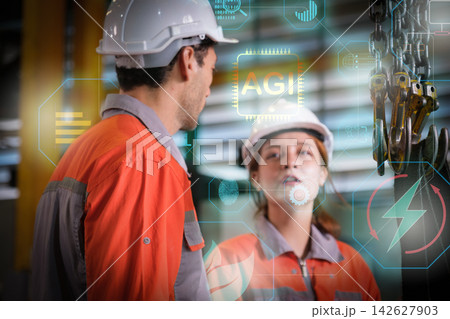The engineer checks the parts coming out of the machine. 142627903