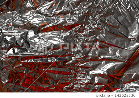 foil texture in silver color with crumpled reflective surface and red reflections, foil texture in silver color with crumpled reflective surface and red reflections, 142628530