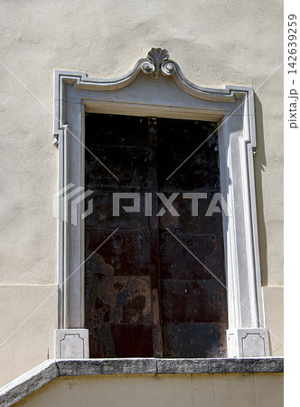 Nitra, Slovakia - May 27, 2024: Historic Bronze Entrance Door of Saint Michael Chapel Nitra, Slovakia - May 27, 2024: Historic Bronze Entrance Door of Saint Michael Chapel 142639259