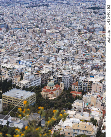 Athens, Attica, Greece, beautiful panoramic view of Athens cityscape, with The Parthenon, mountains, sea and scenery beyond the city, seen from Mount Lycabettus Hill observation deck in a sunny day Athens, Attica, Greece, beautiful panoramic view of Athens cityscape, with The Parthenon, mountains, sea and scenery beyond the city, seen from Mount Lycabettus Hill observation deck in a sunny day 142640562