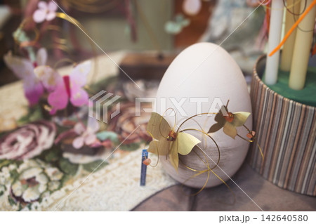 Easter in Greece, caffe and shop decorations, bunnies, multicoloured easter eggs, decorated shopwindow, Easter gifts and souvenirs, showcase, glass case, shopfront decorated in Athens, Attica, Greece Easter in Greece, caffe and shop decorations, bunnies, multicoloured easter eggs, decorated shopwindow, Easter gifts and souvenirs, showcase, glass case, shopfront decorated in Athens, Attica, Greece 142640580