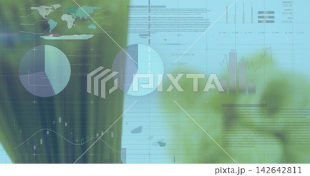Displaying translucent dashboard on screen over blurred plant leaves showing two large pie charts Displaying translucent dashboard on screen over blurred plant leaves showing two large pie charts 142642811