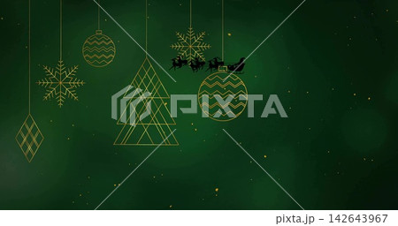 Displaying gold hanging ornaments and black sleigh with four reindeer on deep green gradient Displaying gold hanging ornaments and black sleigh with four reindeer on deep green gradient 142643967
