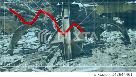 Showing excavator grapple resting among scrap and tire at scrapyard, with blue grid and red line 142644461