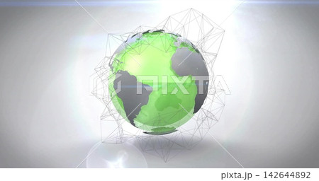 Hovering stylized globe displaying green continents in studio, with wireframe and lens flare Hovering stylized globe displaying green continents in studio, with wireframe and lens flare 142644892